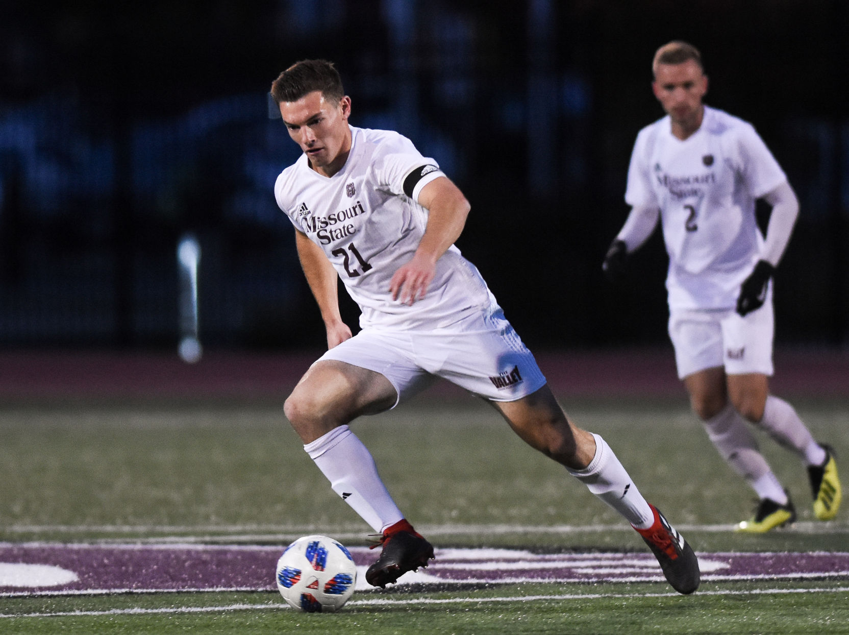 Kyle Hiebert dribbles